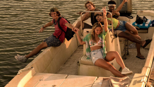 Five Friends Enjoying a Boat Adventure Desktop Wallpaper