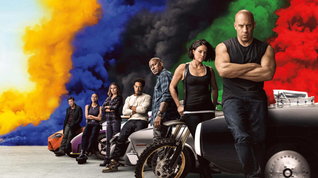 Fast and Furious Cast Standing Before Sports Cars Desktop Wallpaper