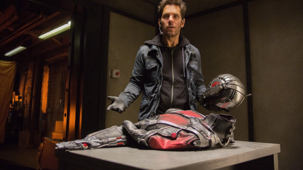 Scott Lang Standing Beside the Ant-Man Suit Desktop Wallpaper