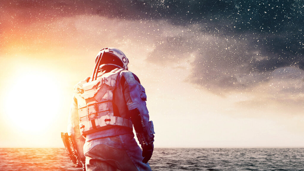 Astronaut Standing on Water Horizon 4K Desktop Wallpaper