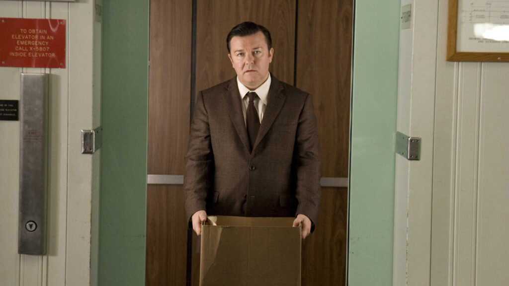 Ricky Gervais Standing with Box Desktop Wallpaper