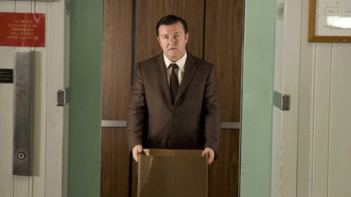 Ricky Gervais Standing with Box Desktop Wallpaper