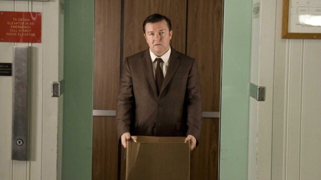 Ricky Gervais Standing with Box Desktop Wallpaper