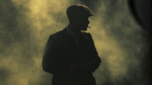 Silhouette of a Man in a Flat Cap Desktop Wallpaper