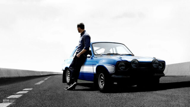 Paul Walker Leaning on a Blue Ford Escort MK1 4K Wallpaper