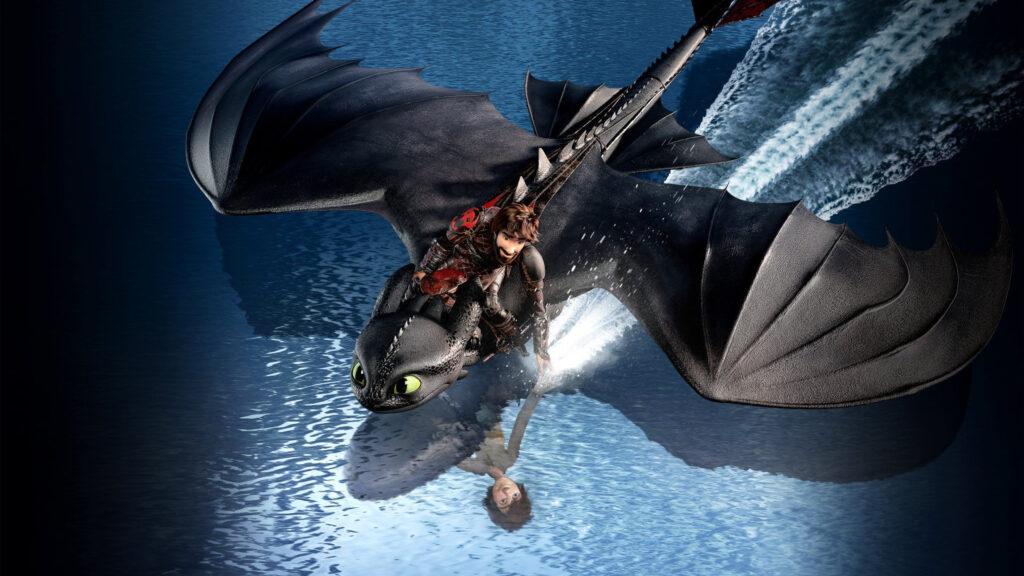 Toothless and Hiccup Flying Over Water Desktop Wallpaper