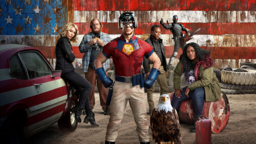Peacemaker Cast Stand Against American Flag Desktop Wallpaper