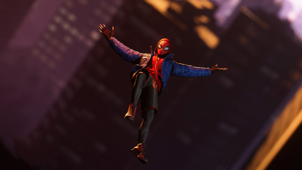 Spider-Man Miles Morales Leaping Through City Air Desktop Wallpaper