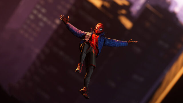 Spider-Man Miles Morales Leaping Through City Air Desktop Wallpaper