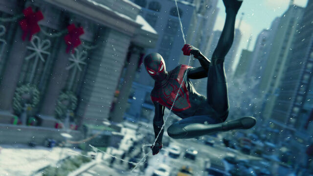 Miles Morales Swinging Through New York City Desktop Wallpaper