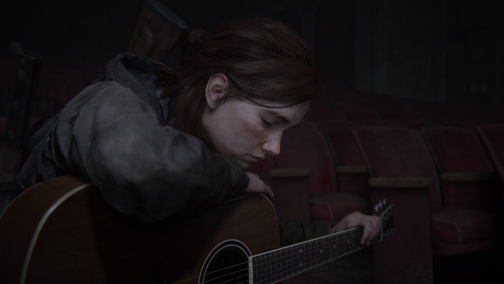 Ellie Sitting with Guitar Cinematic Desktop Wallpaper