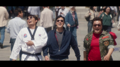 Three Men Walking Together in Public PC Wallpaper