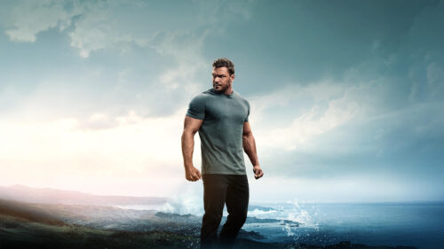 Muscular Man Standing by the Ocean 4K Wallpaper