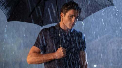 Jacob Elordi Holding an Umbrella in the Rain Desktop Wallpaper