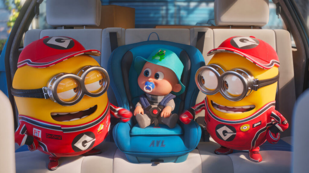 Minions and Baby Gru in a Car Desktop Wallpaper