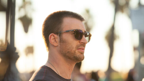 Chris Evans Profile View Sunny Beachside Portrait Desktop Wallpaper