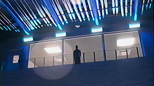 Solitary Silhouette in Futuristic Terminal Desktop Wallpaper