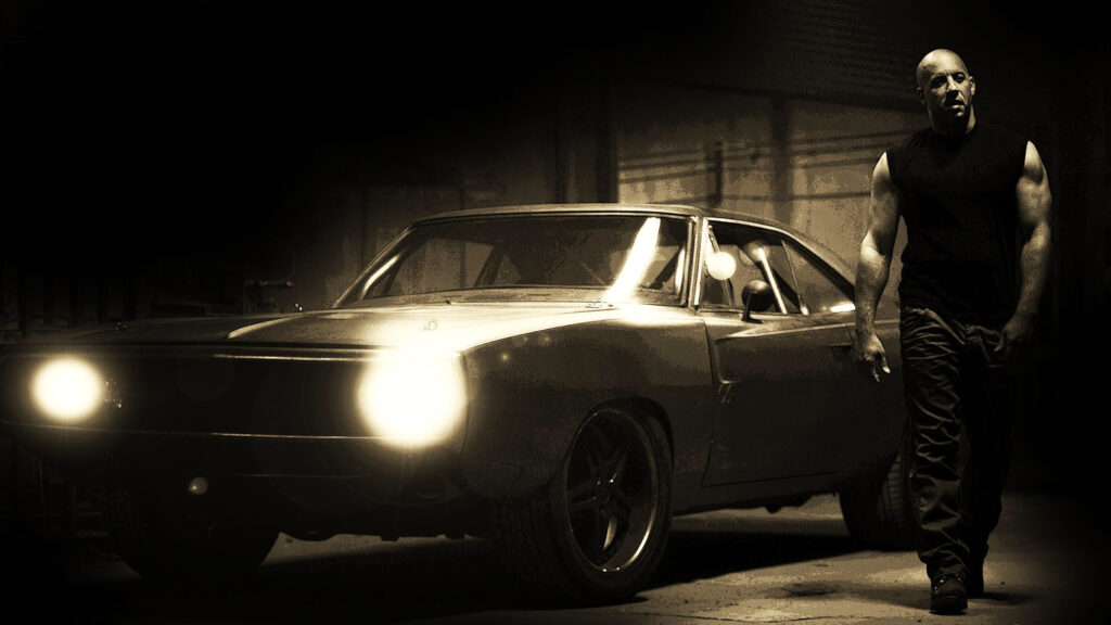 Vin Diesel Standing Next to Muscle Car 4K Wallpaper