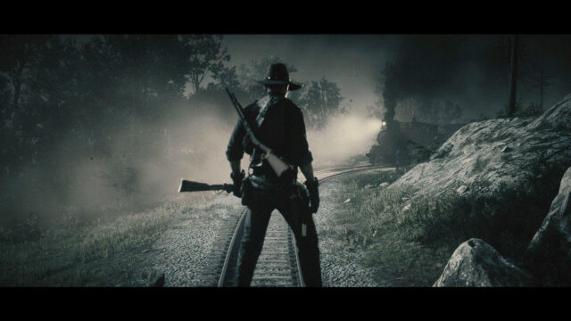 Red Dead Redemption 2 Silhouette on Railroad Tracks Desktop Wallpaper