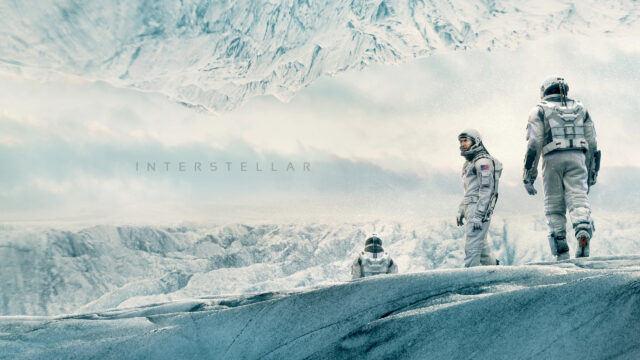 Interstellar Astronauts Exploring an Icy Alien Landscape Desktop Wallpaper