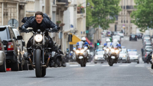 Tom Cruise Riding a Motorcycle in Mission Impossible Desktop Wallpaper