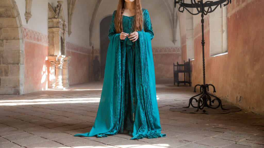 Elegant Woman in Teal Medieval Gown Desktop Wallpaper