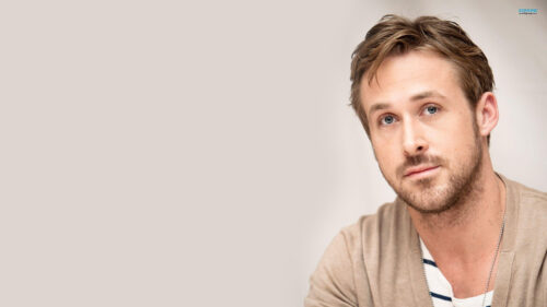 Portrait of Ryan Gosling in a Beige Cardigan Desktop Wallpaper