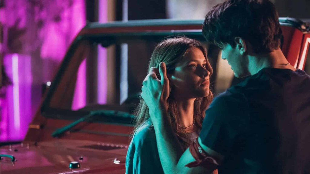 Romantic Couple Under Neon Lights 4K Wallpaper