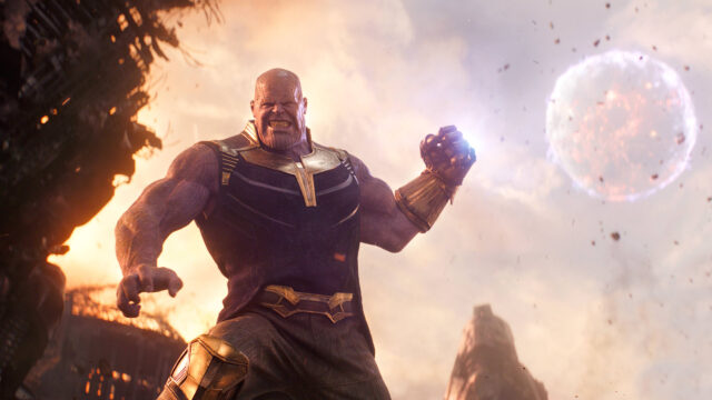 Thanos Unleashing Power on Titan 4K Desktop Wallpaper