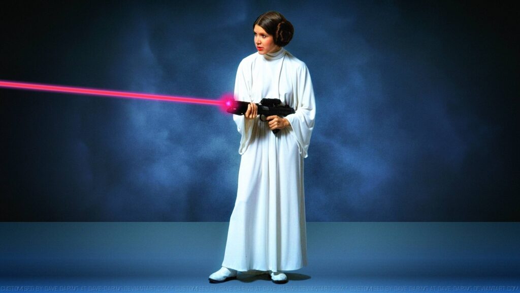 Princess Leia holding a Blaster Star Wars Desktop Wallpaper