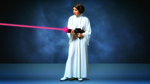 Princess Leia holding a Blaster Star Wars Desktop Wallpaper