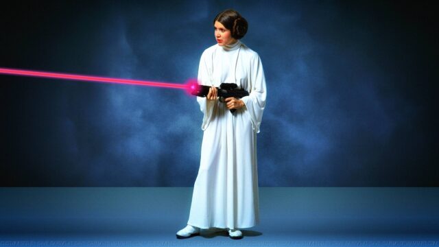 Princess Leia holding a Blaster Star Wars Desktop Wallpaper