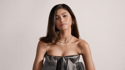 Elegant Portrait of Zendaya in Grey Satin Desktop Wallpaper