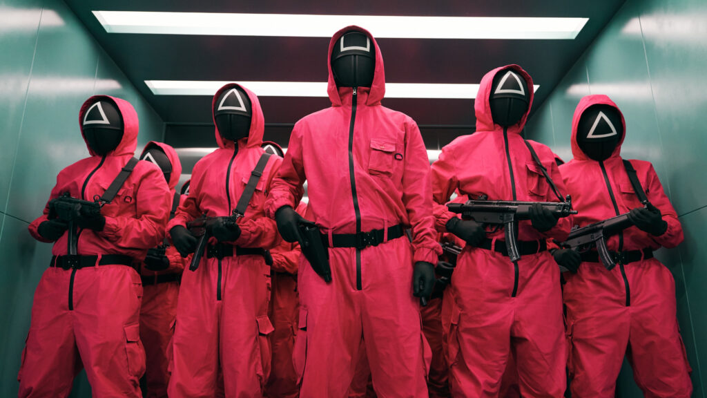 Soldiers in Pink Uniforms from Popular Dystopian Series Desktop Wallpaper