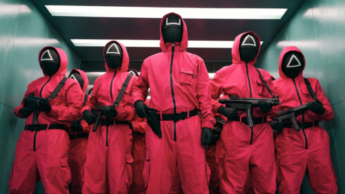 Soldiers in Pink Uniforms from Popular Dystopian Series Desktop Wallpaper