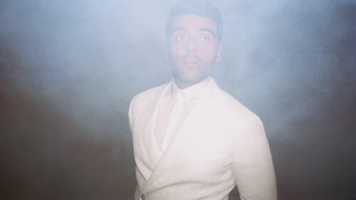 Portrait of a Man in a White Suit Desktop Wallpaper