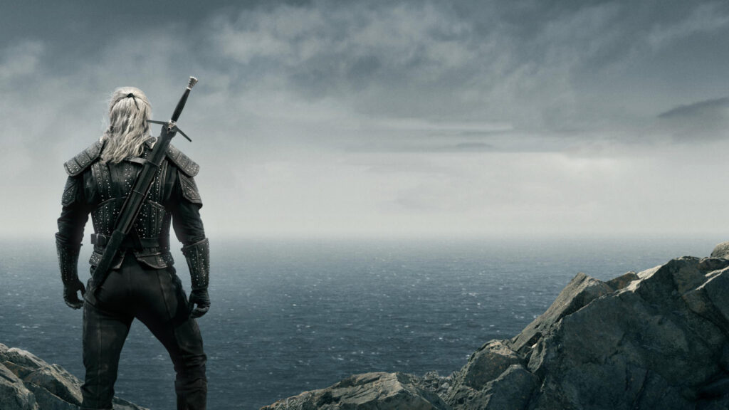 Geralt of Rivia Standing on a Cliff Edge 4K Wallpaper