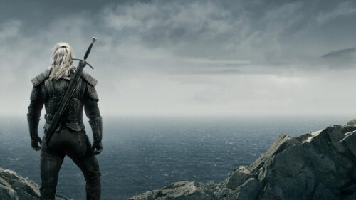 Geralt of Rivia Standing on a Cliff Edge 4K Wallpaper