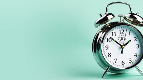 Minimalist Silver Alarm Clock 4K Desktop Wallpaper