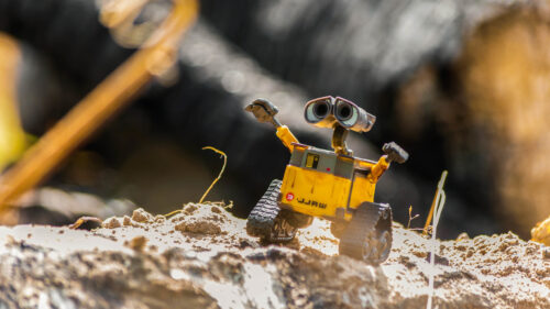 Wall-E Toy Standing on Earthy Terrain Desktop Wallpaper