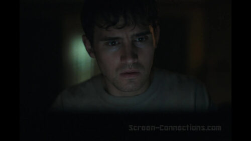 Close-up of a Worried Man Looking at a Screen Desktop Wallpaper
