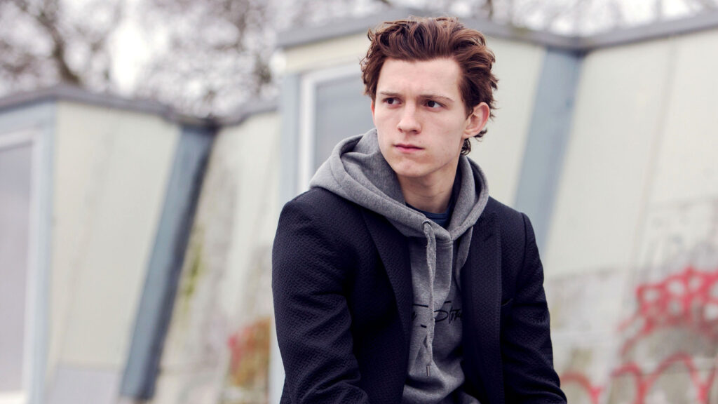 Portrait of Tom Holland in a Hoodie and Blazer Desktop Wallpaper
