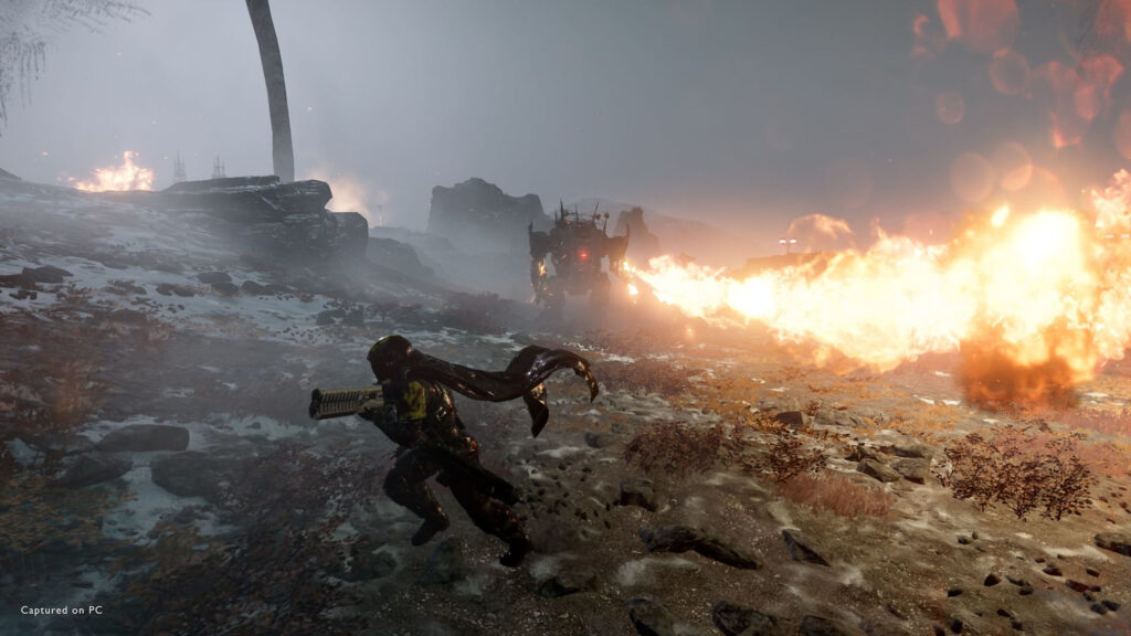 Futuristic Soldier Fleeing a Flaming Mech Desktop Wallpaper