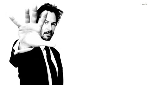 Keanu Reeves Monochrome Hand Gesture 4K Desktop Wallpaper