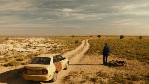 Desert Highway Man Standing Still PC Wallpaper