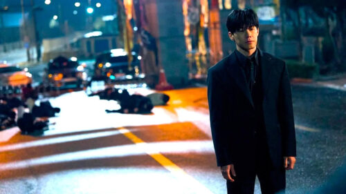 A Killer’s Paradox Lee Tang Standing Amidst the Aftermath Desktop Wallpaper