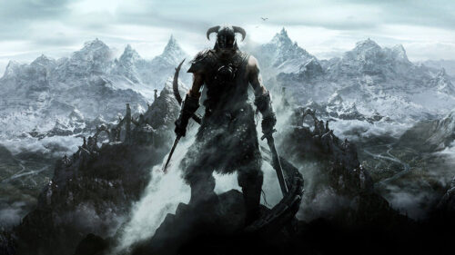 The Dragonborn Standing on Mountain Peak Desktop Wallpaper