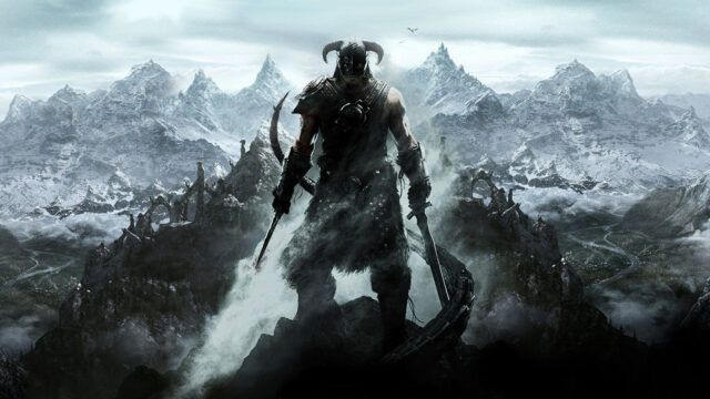 The Dragonborn Standing on Mountain Peak Desktop Wallpaper