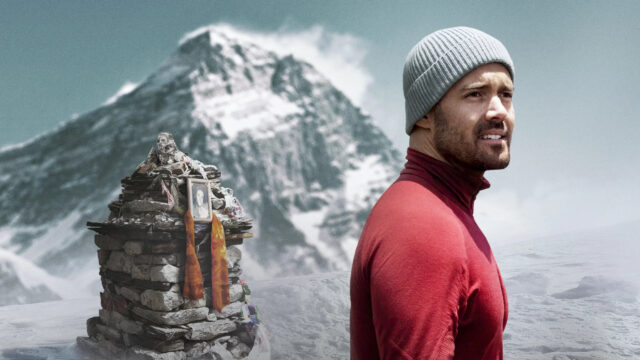 Mountain Climber with Memorial Shrine 4K Desktop Wallpaper