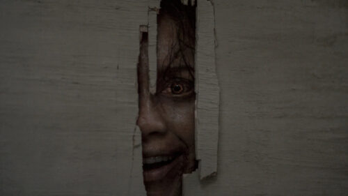 Horror Movie Character Peeking Through Wall Desktop Wallpaper